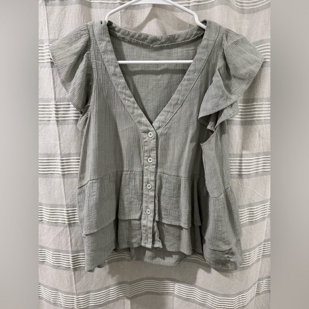 Sage green sleeveless blouse. Size Medium